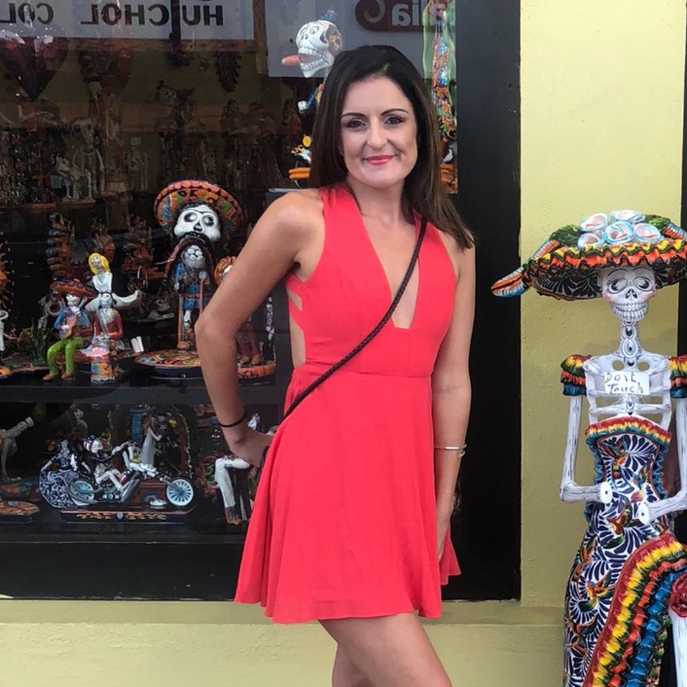 Little red low cut mini dress size XS